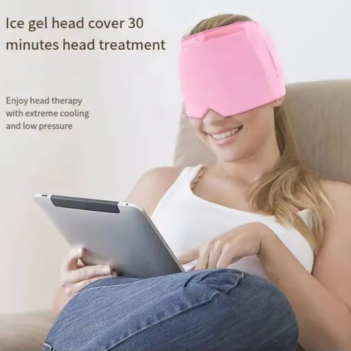 A woman enjoying a cooling gel head treatment while using a tablet. The image shows the HushCrown pink ice gel head cover, designed for extreme cooling and low pressure for effective head therapy