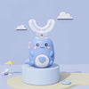 Cute blue dinosaur-themed RelaxRiser™ U-Shaped Electric Toothbrush for kids with soft silicone bristles, placed on a minimal pastel background with toy-like design.