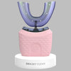 RelaxRiser™ BrightClean U-Shaped Electric Toothbrush in pink, shown standing on a white base with silicone mouthpiece, designed for advanced automatic dental cleaning.